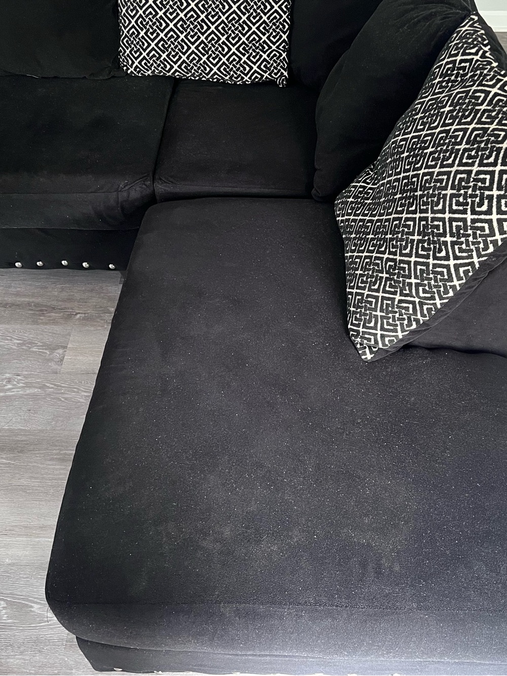 Black Sectional Sofa Chaise with Patterned Accent Pillows